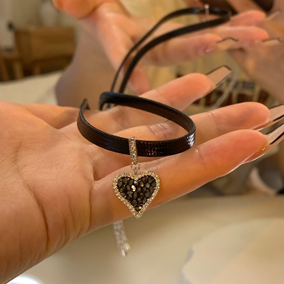 Sparkling Diamond-Studded Black Heart Earrings