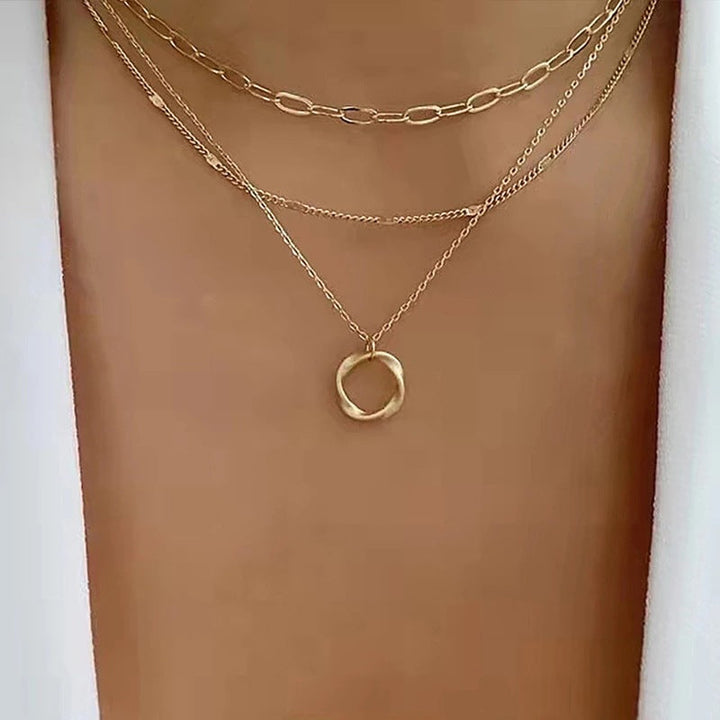 Layered Necklace Featuring a Vintage-Inspired Pendant