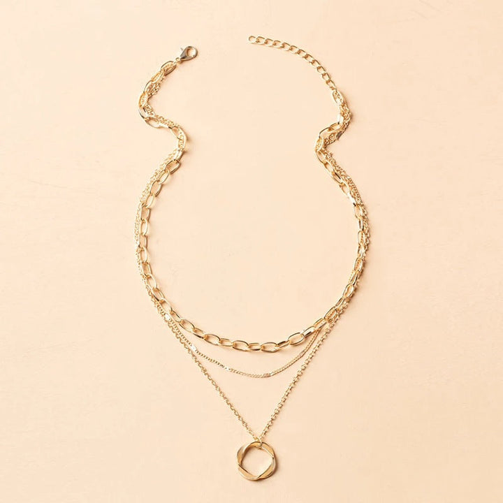 Layered Necklace Featuring a Vintage-Inspired Pendant