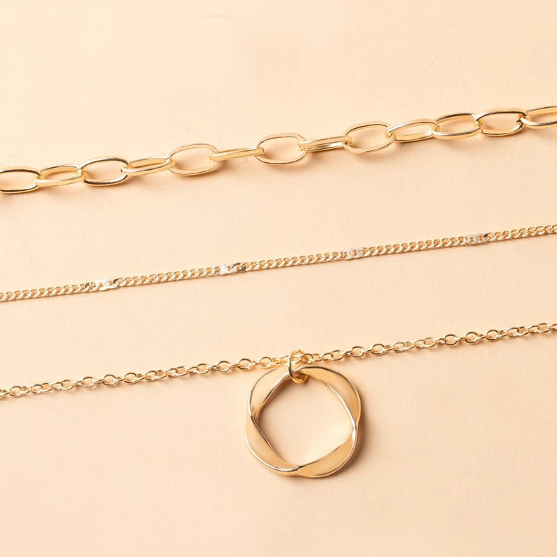 Layered Necklace Featuring a Vintage-Inspired Pendant