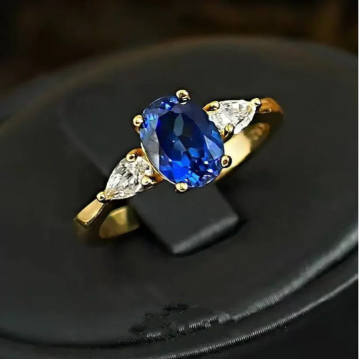 Marin Thorneau Gold Ring with Blue Stone and Crystal Sides