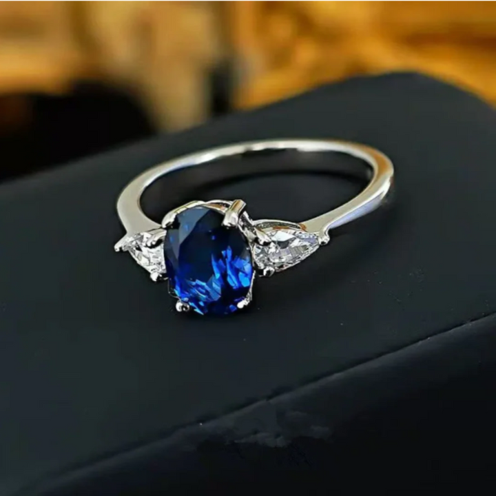 Marin Thorneau Gold Ring with Blue Stone and Crystal Sides